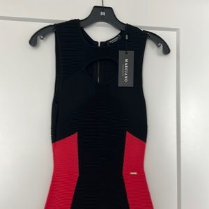 Brand new Marciano dress, never worn. In size Xs.
